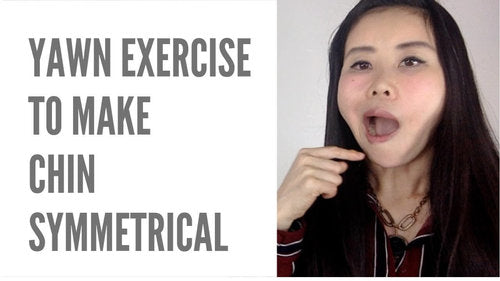 ideo thumbnail showing a woman performing a yawn exercise to make the chin symmetrical, with text 'Yawn Exercise to Make Chin Symmetrical