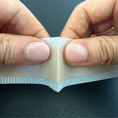 Image demonstrating the correct way to tear Sleep Tape, showcasing the technique for preparing and applying the tape for optimal nighttime use.